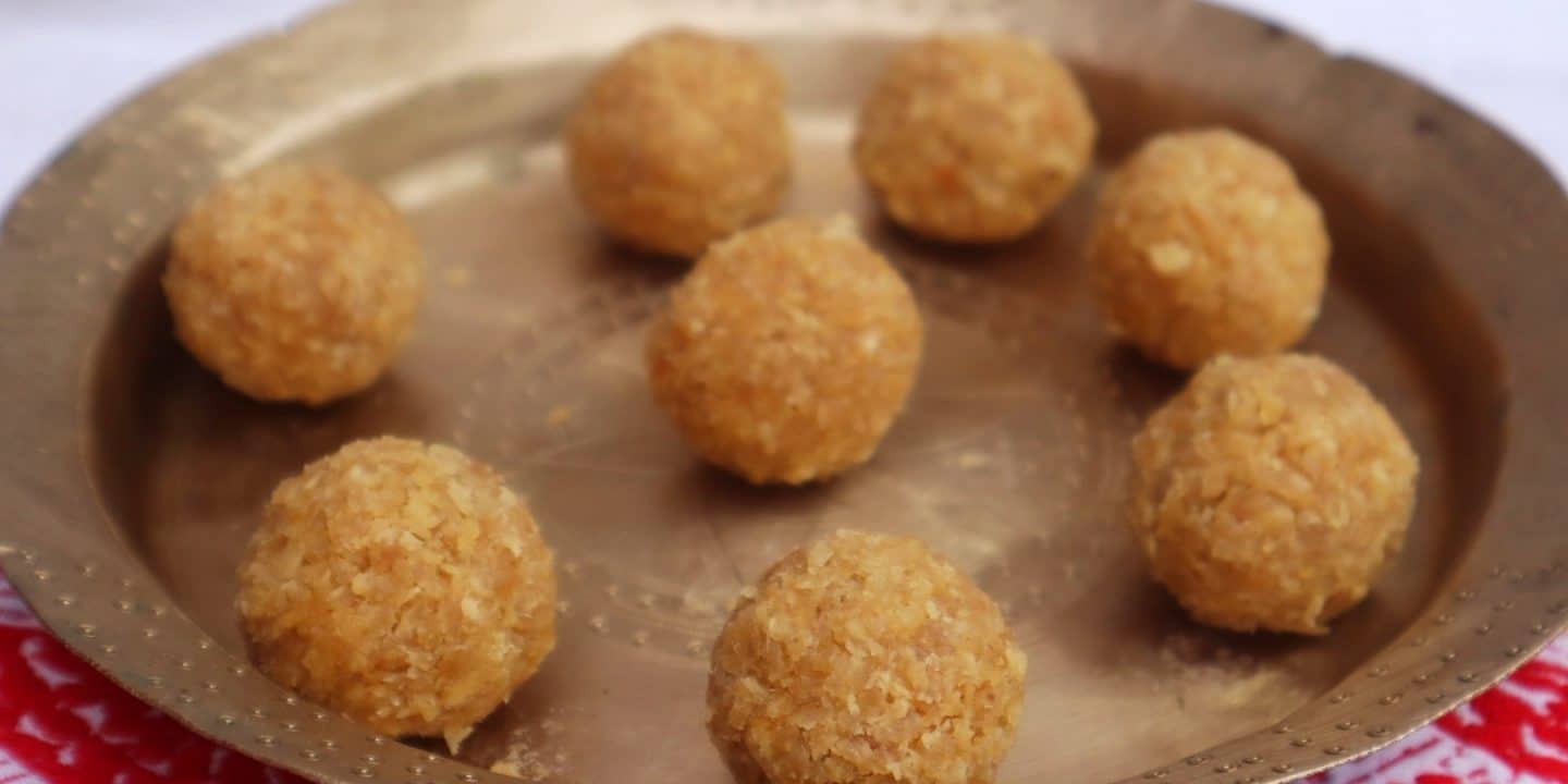 A plate of delightful laru balls packed with flavor and sweetness perfect for a treat 