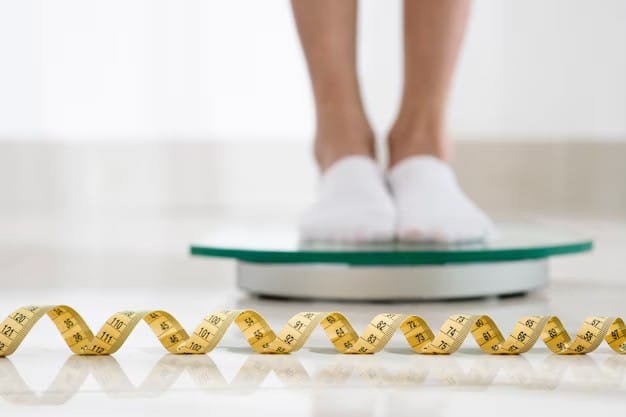 Weighing scale displaying body weight measurement