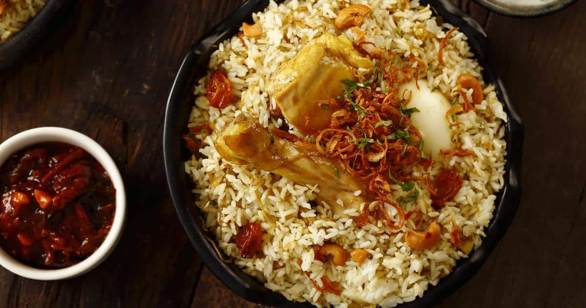 Thalassery biryani is served with red chilli pickle