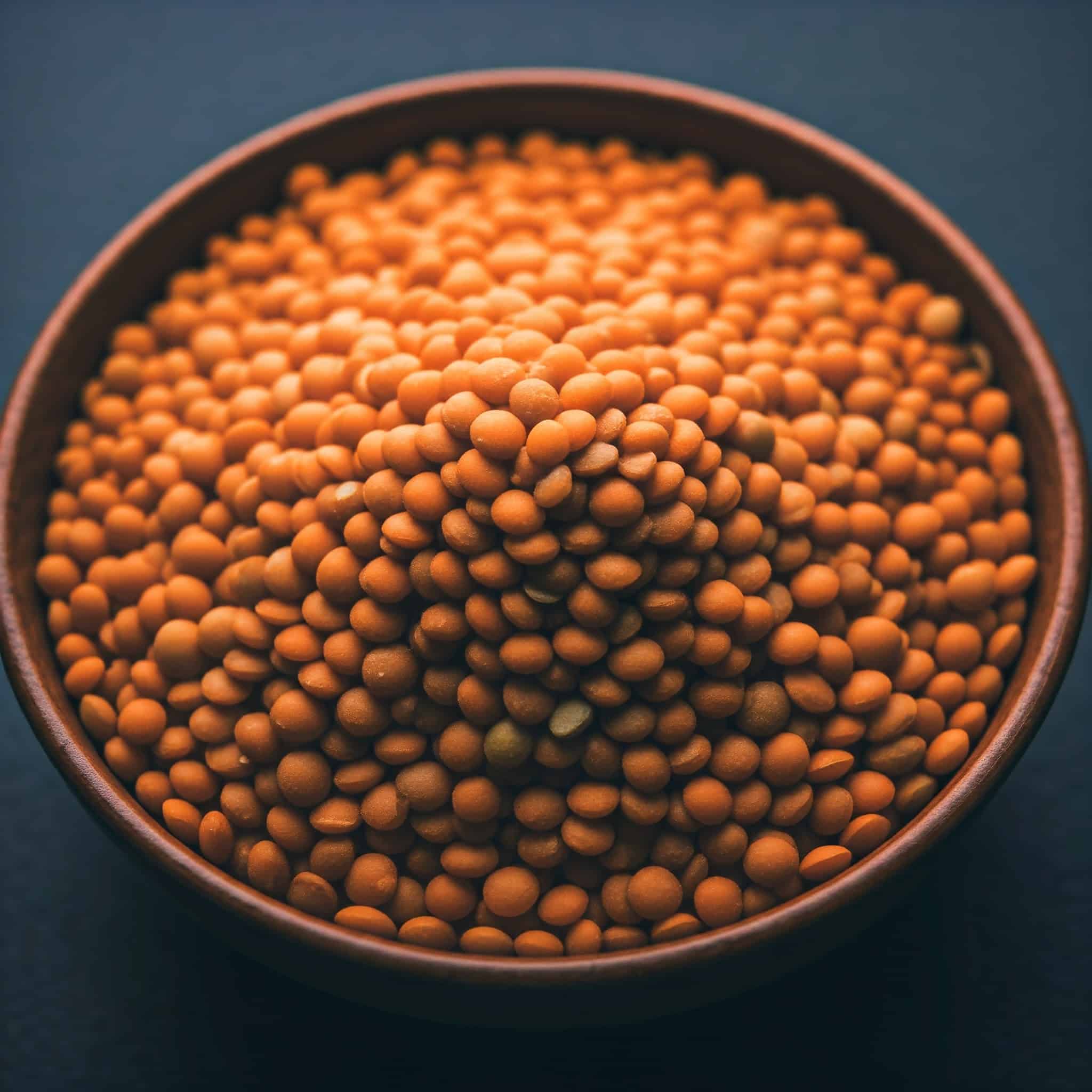 A bowl of uncooked masoor dal.