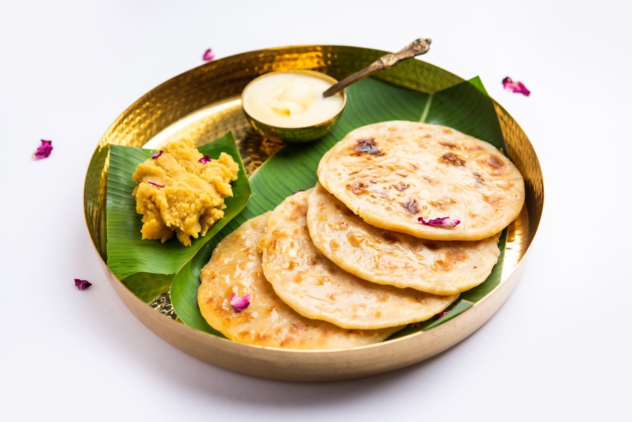 Golden flatbread stuffed with a sweet lentil filling