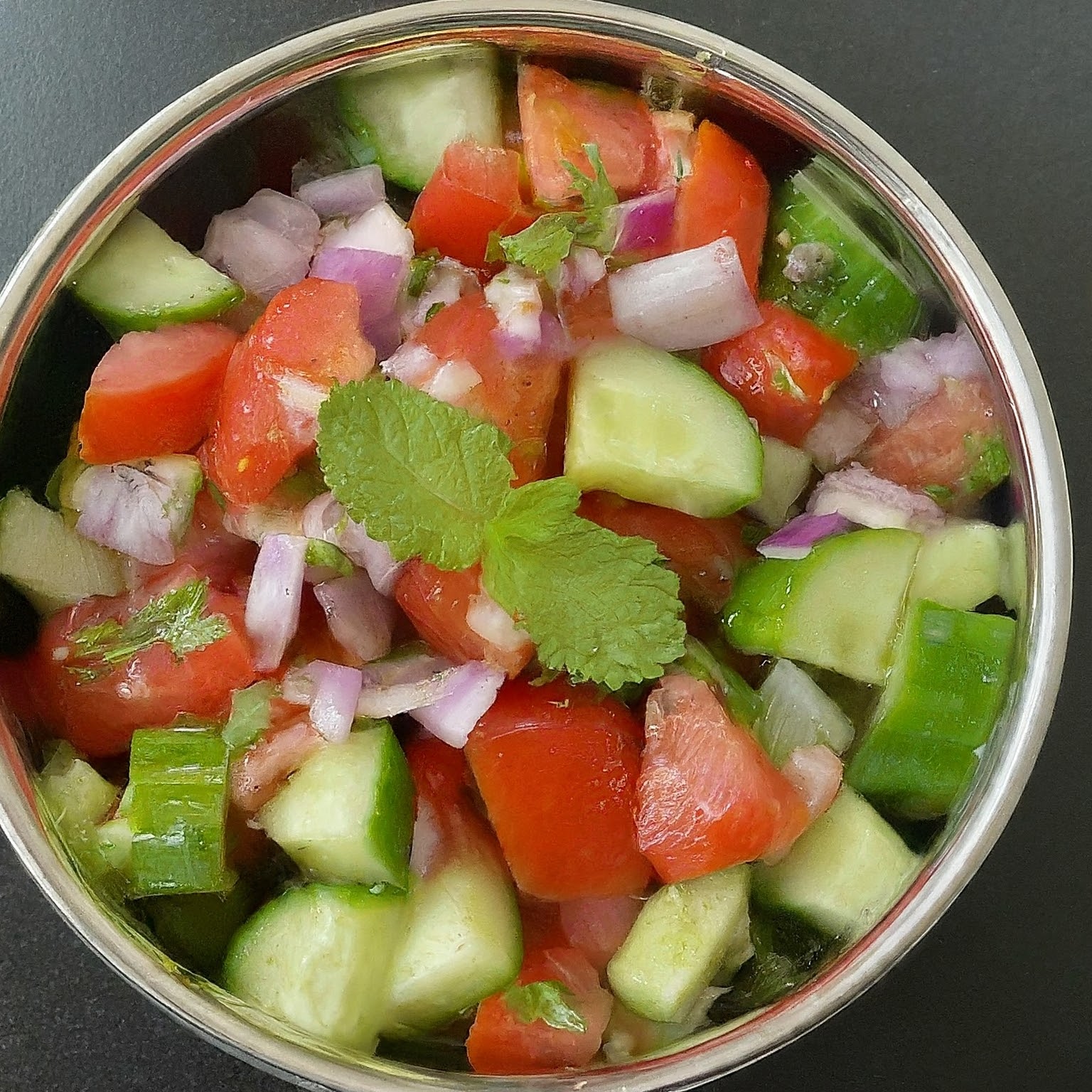 cucumber tomato and onion rich Indian salad is ready to eat with all sorts of foods 