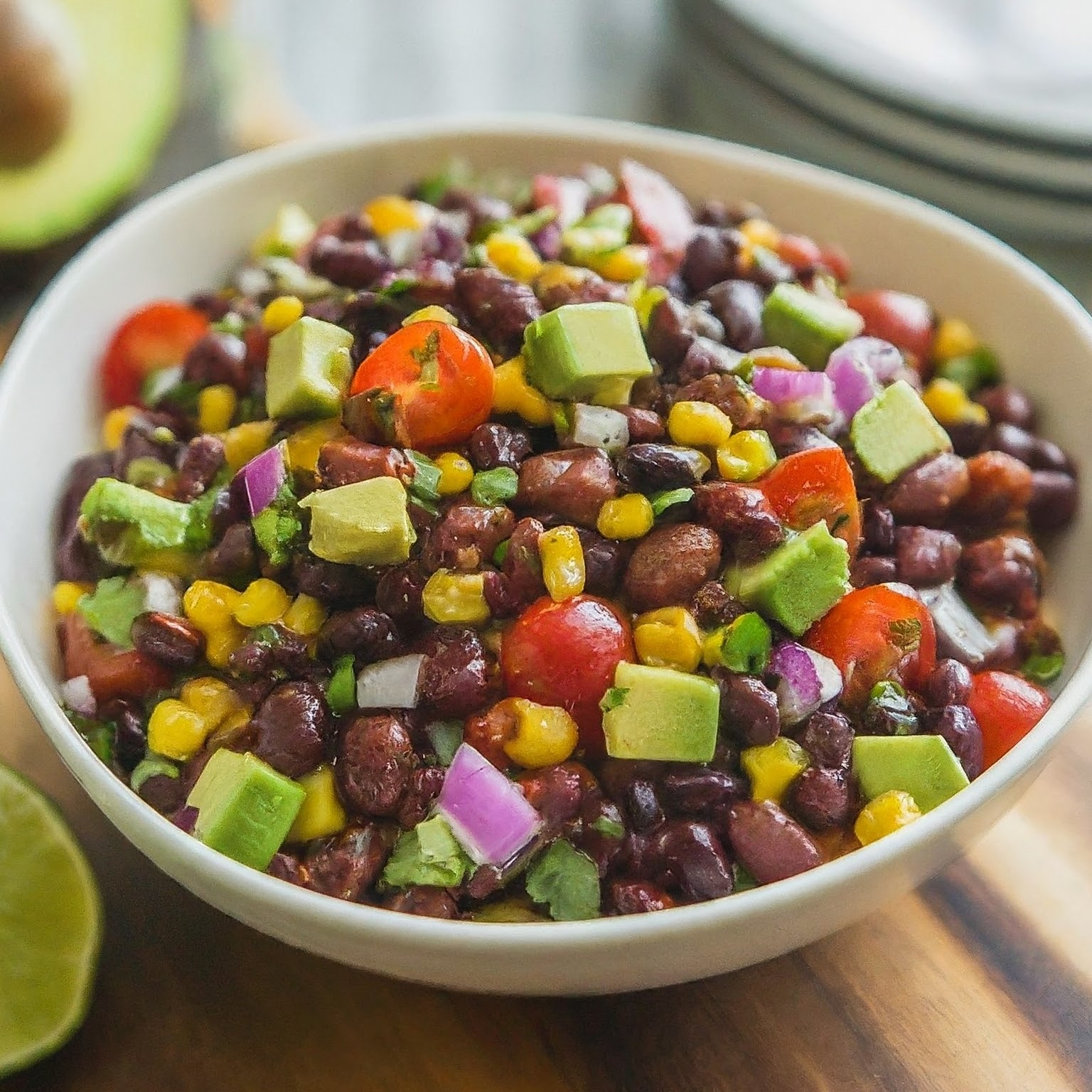 freshly made mexican bean salad fused with red and black beans tomatoes onions and many more ingredients