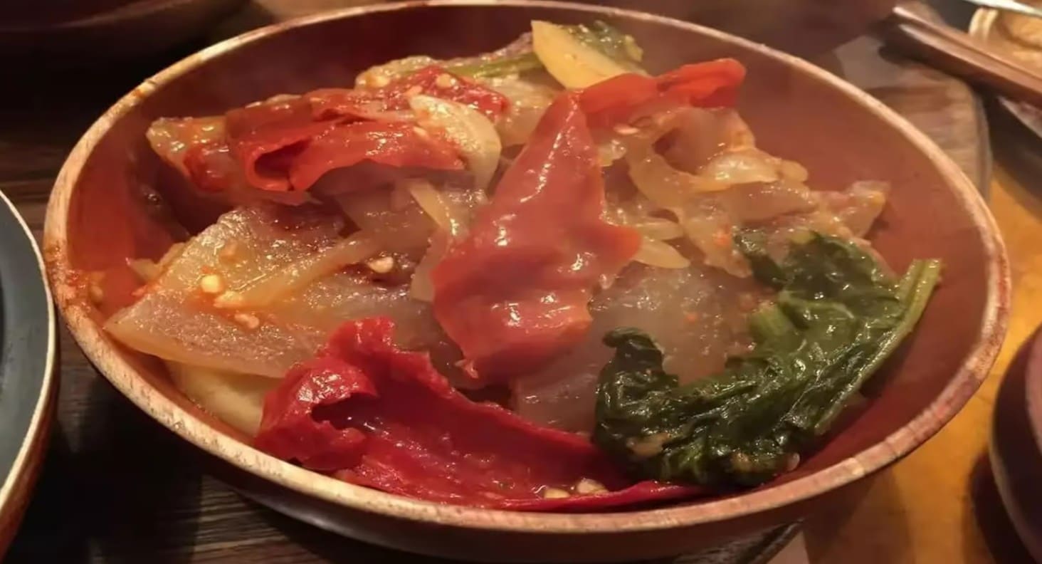 A plate of phagshapa a traditional Sikkim dish made with yak meat and fermented soybeans